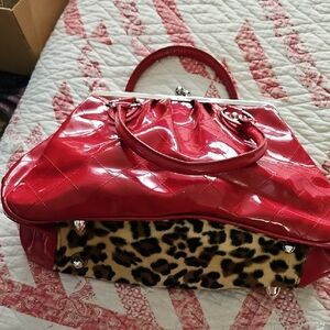 Chic Red Patent Leather Satchel with Leopard Accent